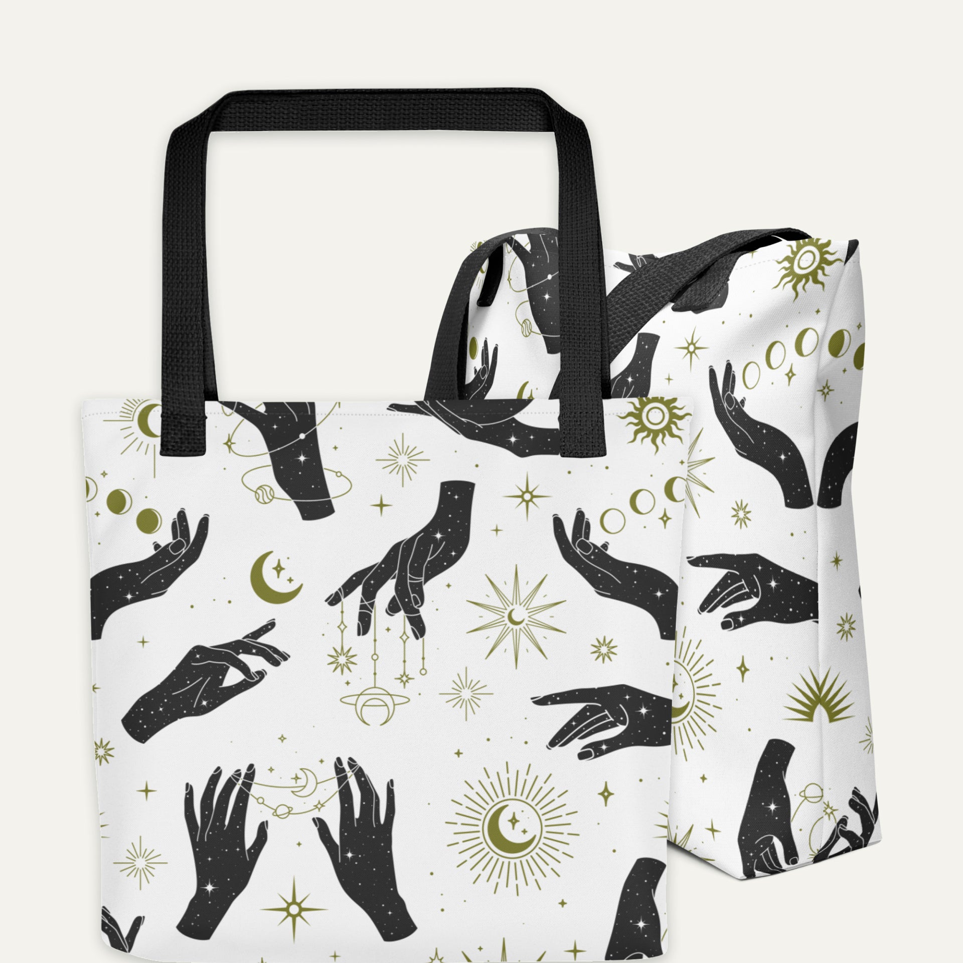The Hands of Fate tote bag displayed from multiple angles, featuring a white base with black celestial hands, stars, and lunar designs, paired with black handles.